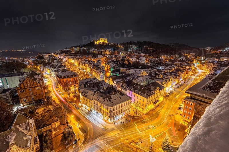 The lights of the snow-covered town of Marburg an der Lahn glow in the evening, Wetterau, Marburg, Hesse, Germany, Europe