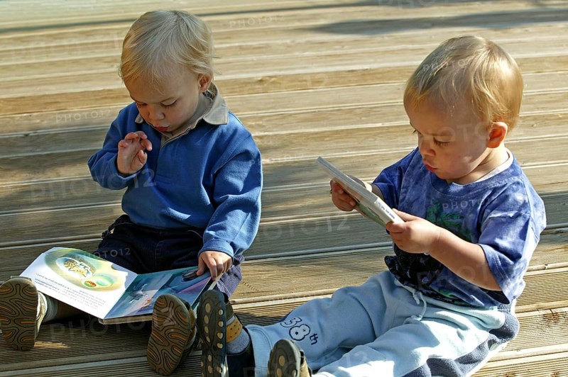 Boys reading a Book