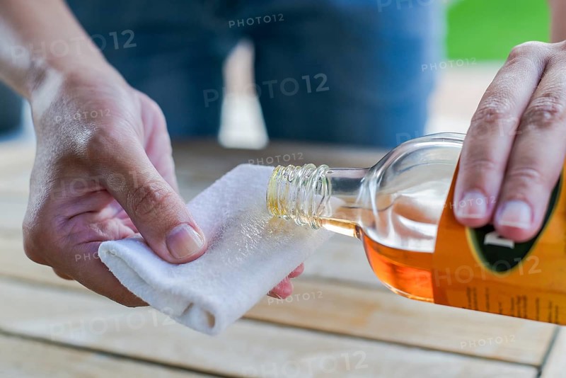 Impregnate wooden table with oil