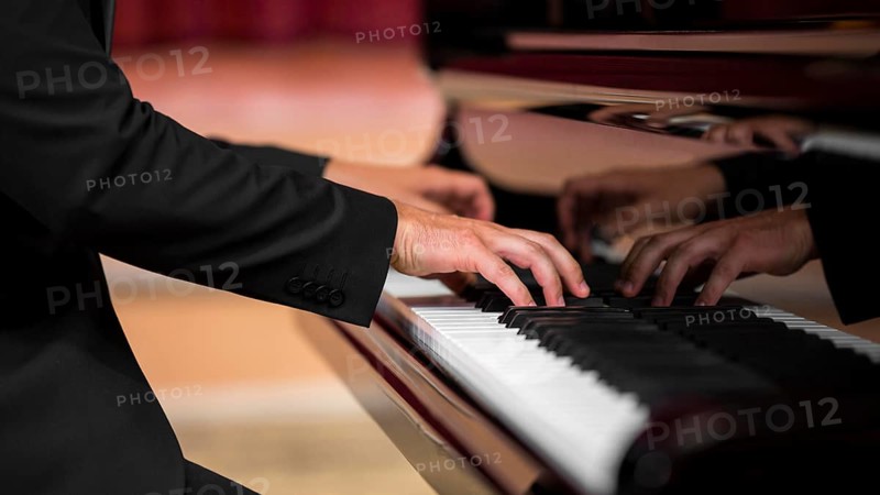 Man having classical piano recital