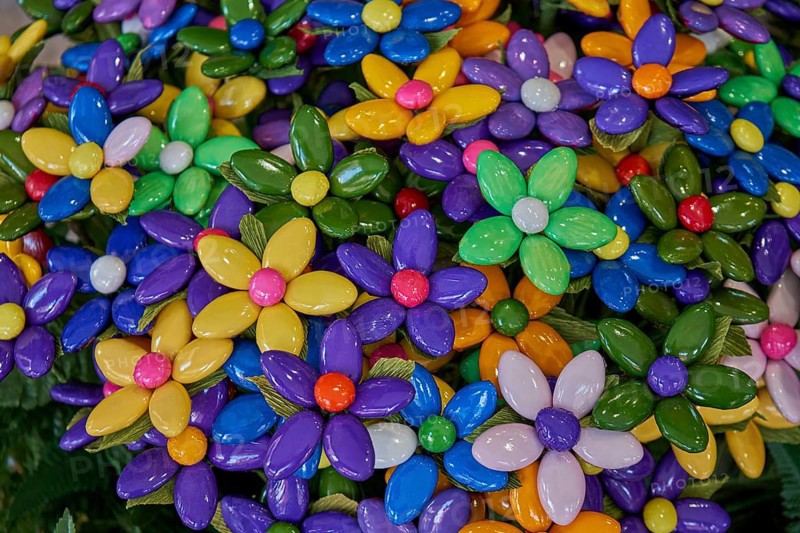 Colourful flowers made of confetti, shiny caramelised almonds, traditional sweet from Sulmona, province of L'Aquila, Abruzzo region, Italy, Europe