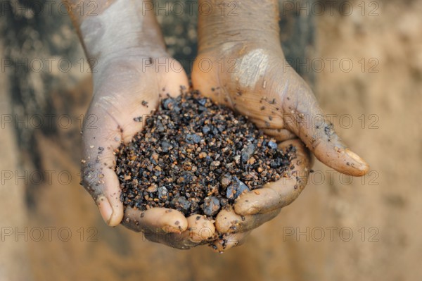 Coltan metal ore, open pit coltan mining, Muhanga coltan mines, Rwanda, Africa