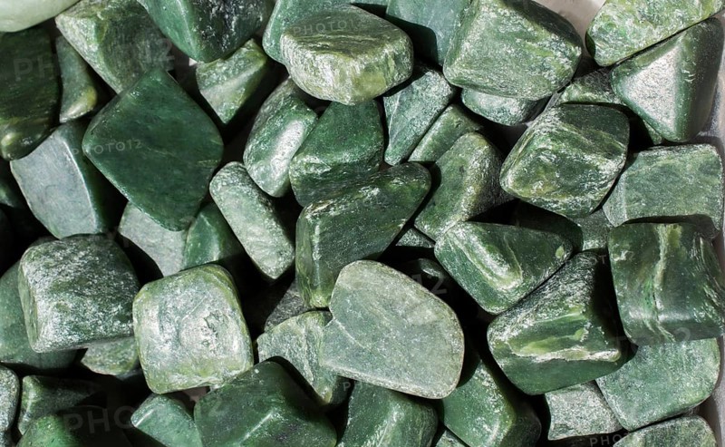 Jade gem stone as natural mineral rock specimen