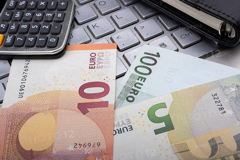 Euro banknotes, calculator Business and finance concept