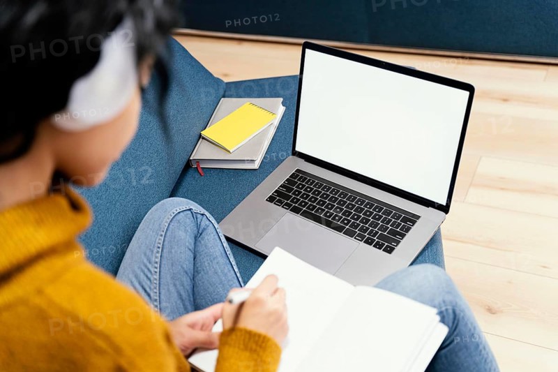 Teenage girl with headphones laptop during online school. Beautiful photo