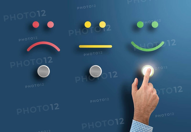 customer service rating and survey concept with hand touching interface button with smiling face
