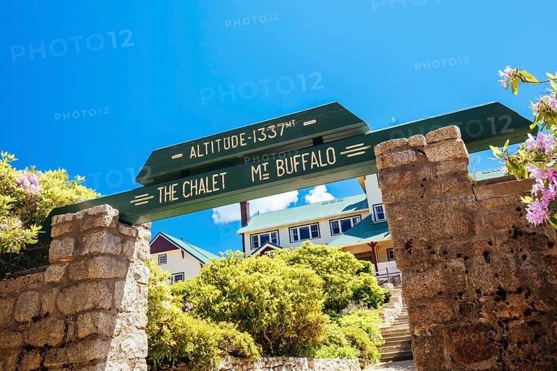 MT BUFFALO, AUSTRALIA- DECEMBER 29 2021: The Mount Buffalo Chalet on a warm summer's day. It was built in 1910 as Australia's first ski resort in the Victorian Alps and is a historic landmark in Victoria, Australia, Oceania