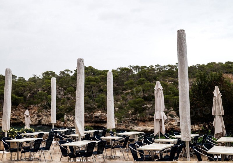 Empty restaurant terrace in the low season in Cala Figuera near Santanyí, Majorca, Balearic Islands, Spain, Europe