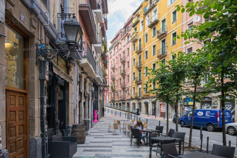 The San Frantzisko district of Bilbao, a poor, multi cultural and exciting part of the city. Public square at the Zaharra street with shops and pubs
