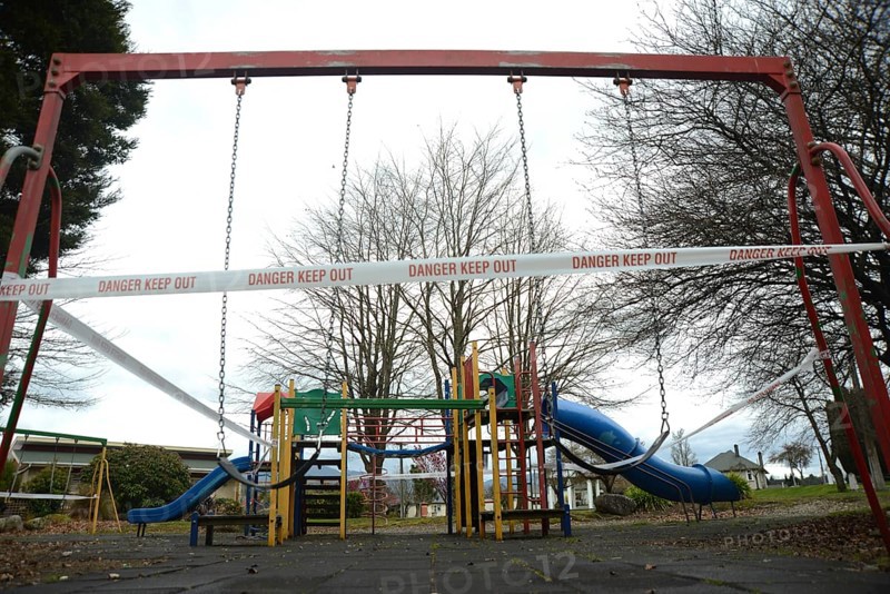 REEFTON, NEW ZEALAND, SEPTEMBER 6, 2021: Signage and barriers warn children away from a public playground during the Covid 19 lockdown in New Zealand, September 6, 2021