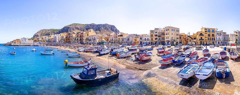 colorful fishing boats at the port of aspra, sicily