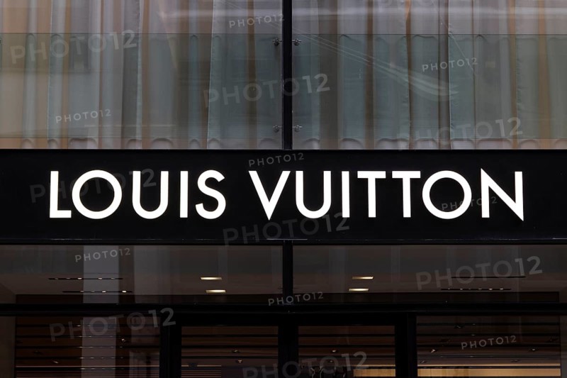 Close-up, logo of the French luxury fashion brand Louis Vuitton on a boutique in the shopping street Neuer Wall, Hamburg, Germany, Europe
