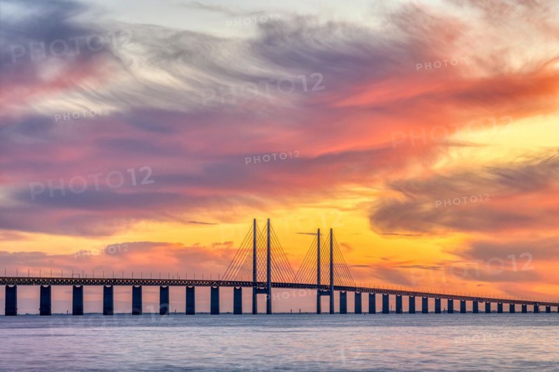 The Øresund Bridge between Denmark and Sweden at a spectacular sunset