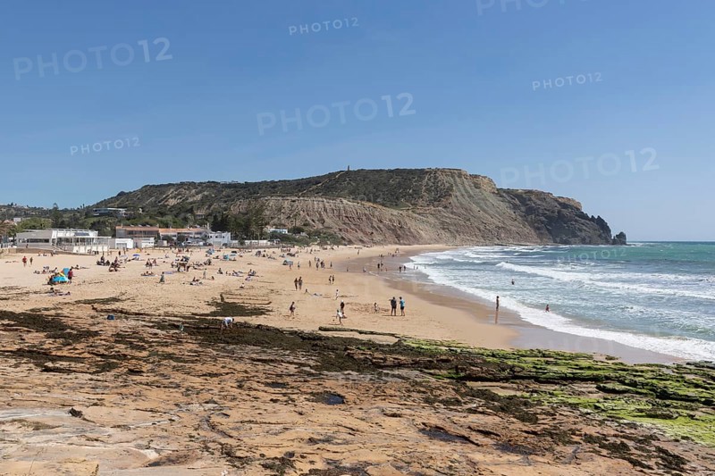 Bathers on the sandy beach in Praia da Luz, Faro district, Algarve, Portugal, Europe