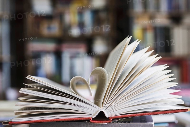 Book with its pages shaping as heart