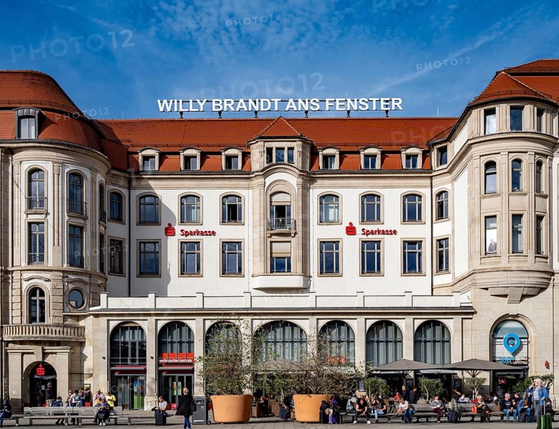 The inscription Willy Brandt ans Fenster on the former Interhotel Erfurter Hof and a photo of Willy Brandt in the window of the building on Willy-Brandt-Platz opposite Erfurt's main railway station commemorate the visit of the then German Chancellor Willy Brandt on 19 March 1970, who showed himself at the hotel's window after thousands of GDR citizens shouted: Willy Brandt at the window, Erfurt, Thuringia, Germany, Europe