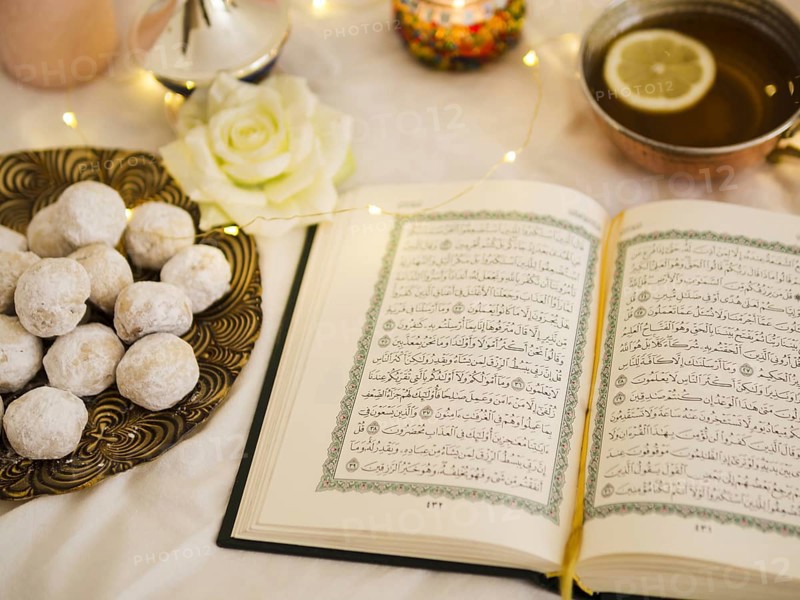Top view quran with tea pastry. Resolution and high quality beautiful photo