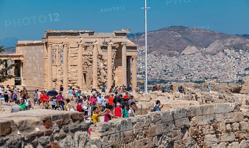 A picture of a crowd of tourists at the Acropolis of Athens