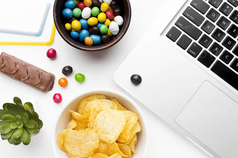 Bowl with unhealthy snacks