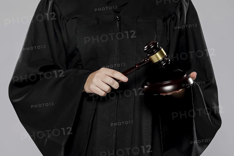 Front view female judge with gavel. Resolution and high quality beautiful photo