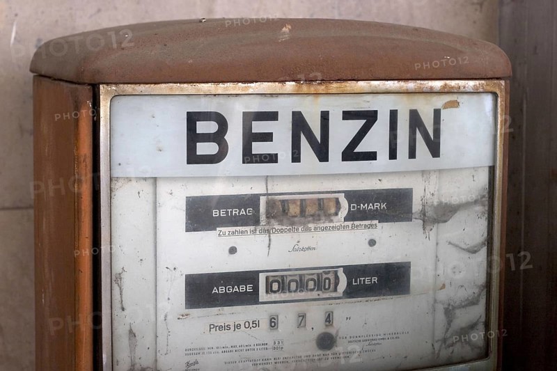Old rusty german petrol pump, the lettering is in german, Benzin means petrol or gasoline, Munich, Bavaria, Germany, Europe