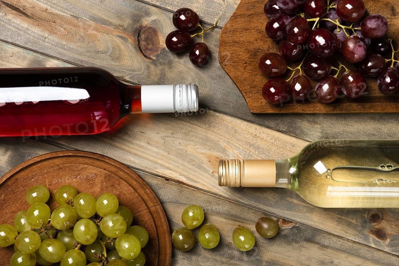 Top view wine bottles with grapes. Resolution and high quality beautiful photo