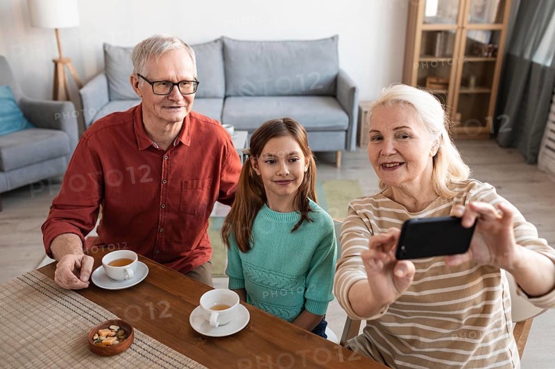 Grandparents girl taking selfie