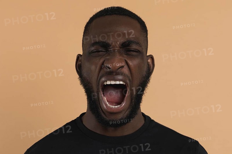 Man screaming despair