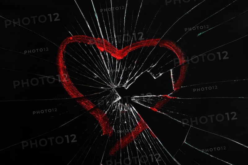 Broken glass with drawn heart