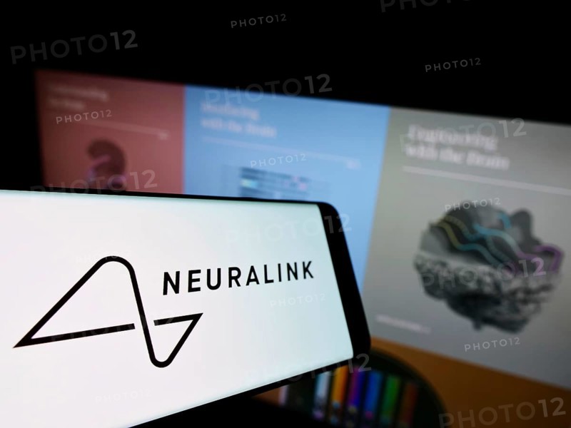 Stuttgart, Germany, 01-30-2022: Mobile phone with logo of US neurotechnology company Neuralink Corporation on screen in front of website. Focus on center-left of phone display, Europe