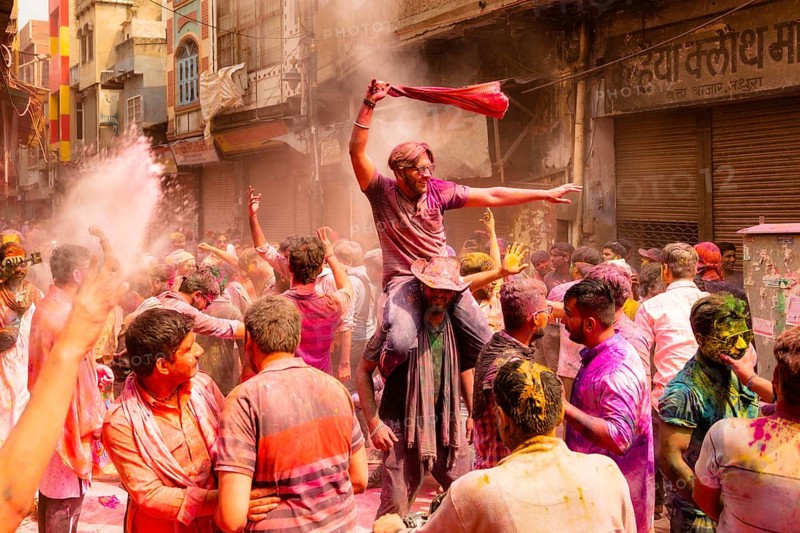 Holi Festival of Colors in the streets of Mathura, India, Asia