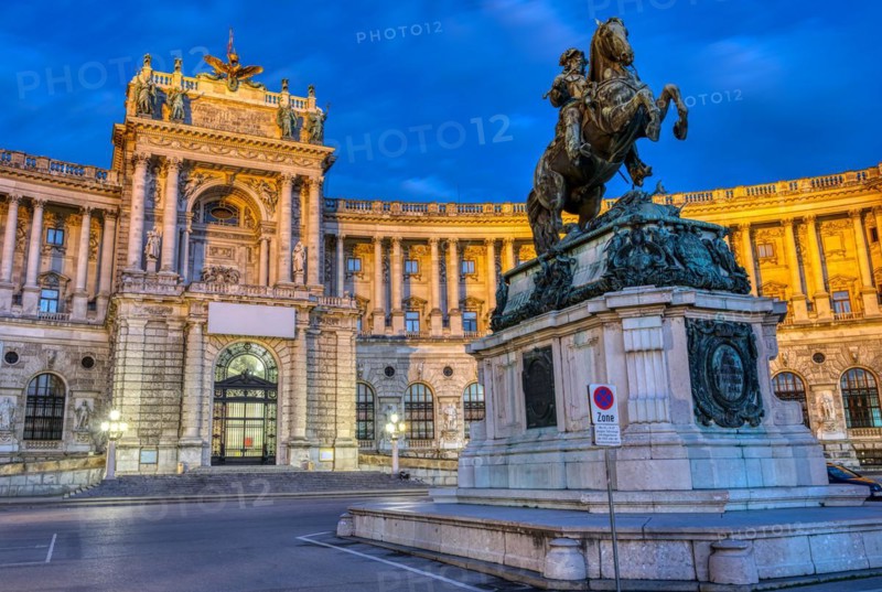 The Prince Eugene statue with part of the Hofburg Imperial Palace in Vienna by night