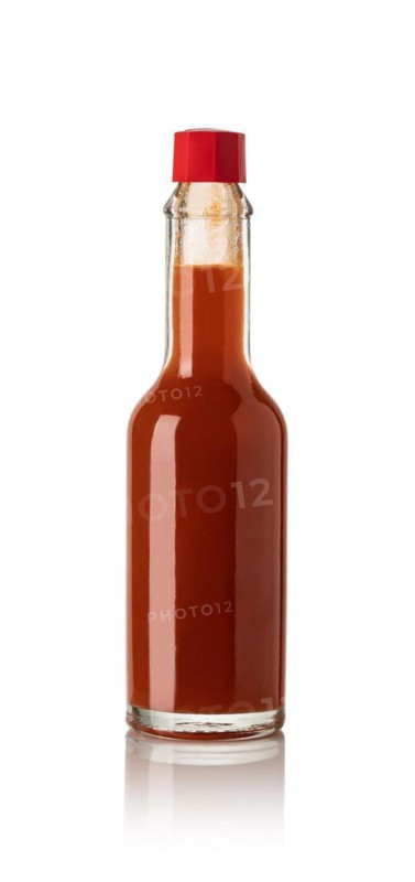 red hot sauce, bottle of spicy isolated on white background
