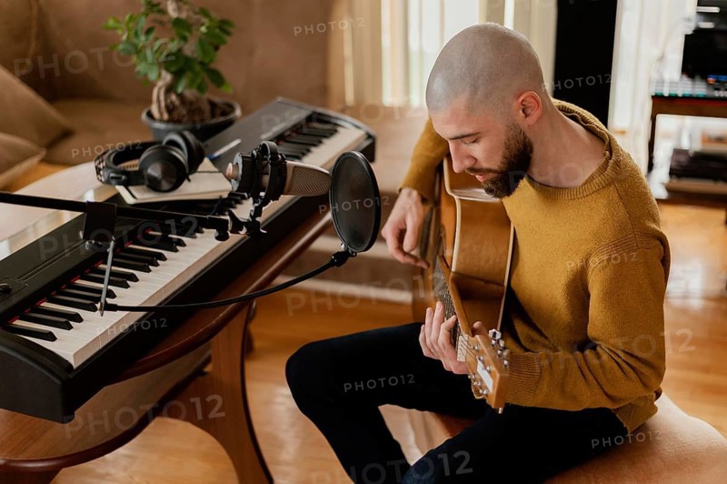 Creative musician practicing indoors