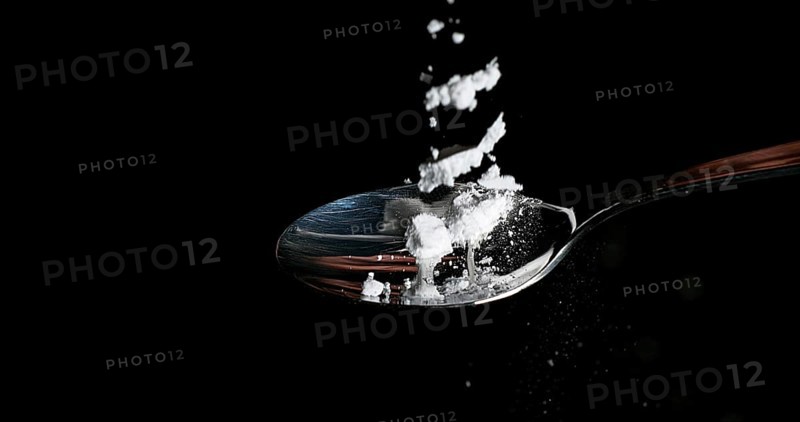 Drug, Cocaine in spoon against black background