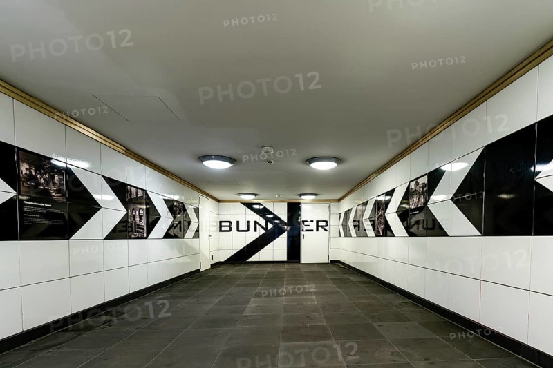 Unfamiliar perspective of the hallway at the Berlin Anhalter Bahnhof undergroundstation with the entrance to a former bunker