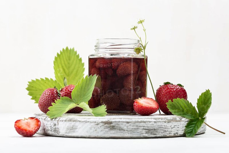 Arrangement with strawberries jar
