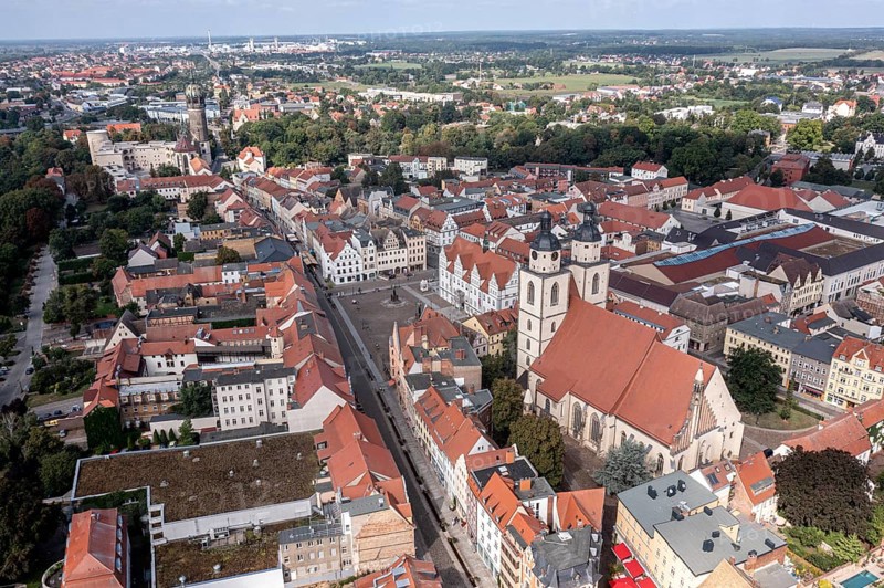 Drone shot, aerial view, drone photo, picture from above, historic town church St. Marien, view over the market place and half-timbered houses to the castle church, Luther city Wittenberg, Saxony-Anhalt, Germany, Europe