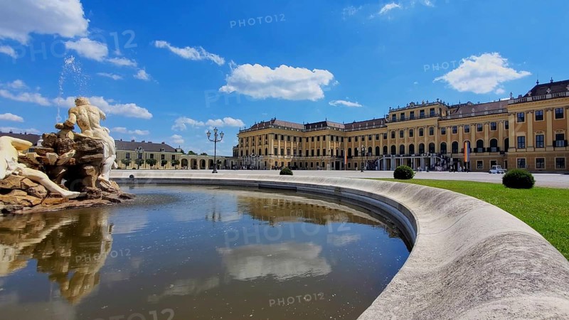 Austria, Schonbrunn Palace Imperial fountain in royal Gardens in Vienna, Europe
