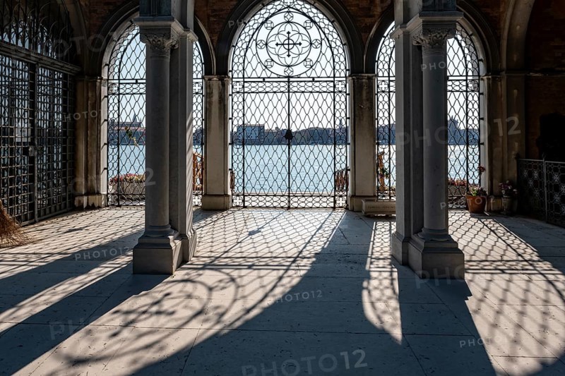 Gate at the cemetery wall, view of the lagoon, Cemetery Island San Michele, Venice, Italy, Europe