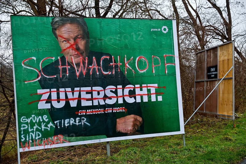 Denigration of a large poster for the 2025 federal election by the Greens with Robert Habeck, Witten, Ruhr area, Germany, Europe