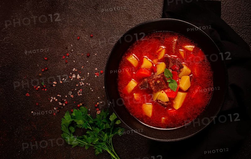 Meat goulash, with potatoes and carrots, sweet pepper, traditional Hungarian soup, homemade, no people