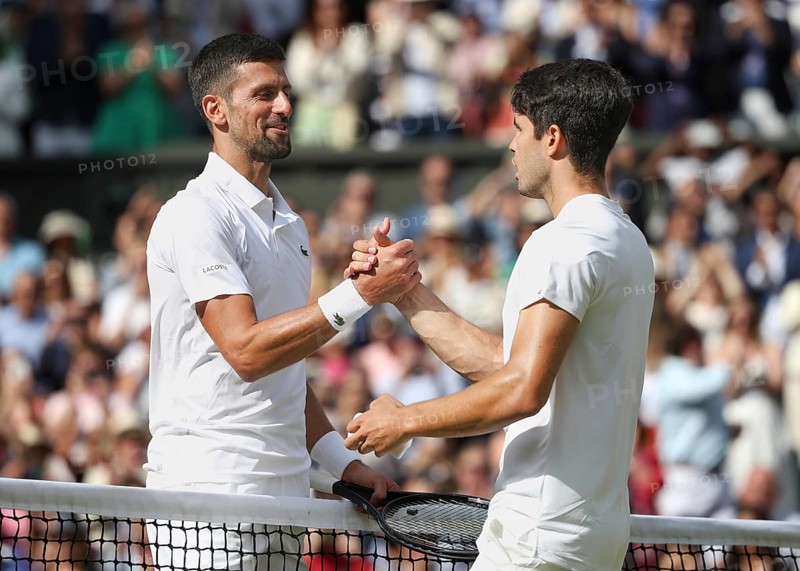 Serbian tennis p (layer Novak Djokovic congratulates the winner Carlos Alcaraz at the 2024 Wimbledon Championships, London, England.Carlos Alcaraz (ESP)