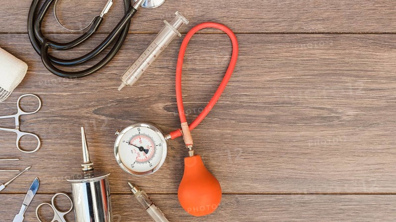 Sphygmomanometer stethoscope medical equipment s wooden desk