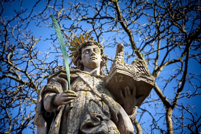 An angel in front of the abbey church St. Stephanus and St. Vitus, Abbey Castle Corvey in Hoexter, Weserbergland, North Rhine Westphalia, Germany, Europe