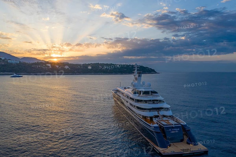 Aerial view of 133 metre motor yacht AL MIRQAB, delivered in 2008 by the German shipyard Kusch Yachts, Peters Schiffbau to Sheikh Hamad bin Jassim bin Jaber bin Muhammad Al Thani, member of the royal family of Qatar, designer Tim Heywood, early in the morning at anchor off the Principality of Monaco, Cote d'Azur, Mediterranean Sea
