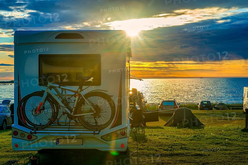 Motorhome, standing, meadow, Atlantic Ocean, sunset, midnight sun, backlight, beach, Lofoten, Norway, public area, Europe