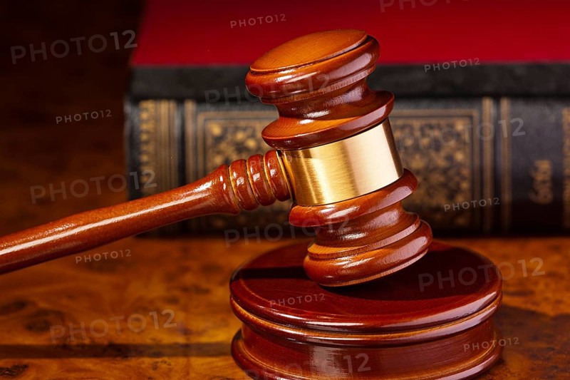 The gavel of a judge in court. Lying on a desk. Austria