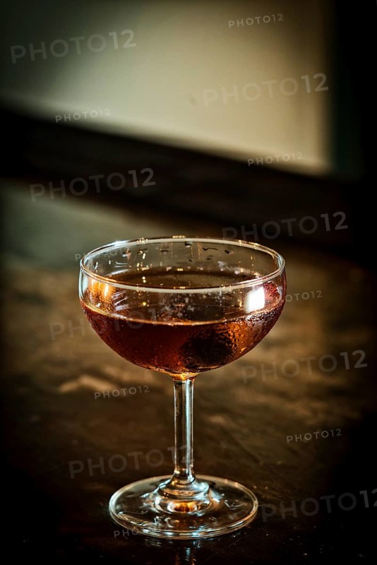 Manhattan classic whisky cocktail drink in modern bar