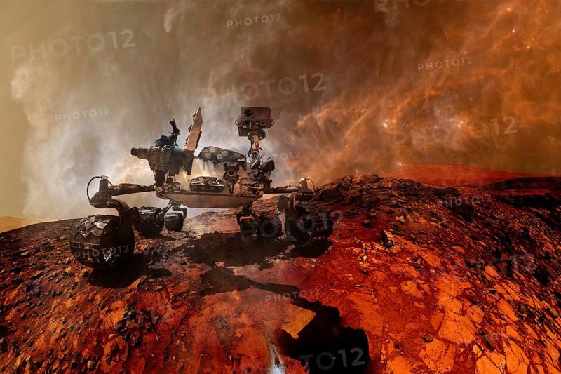 Curiosity rover exploring the surface of Mars. Science fiction wallpaper. Elements of this image furnished by NASA